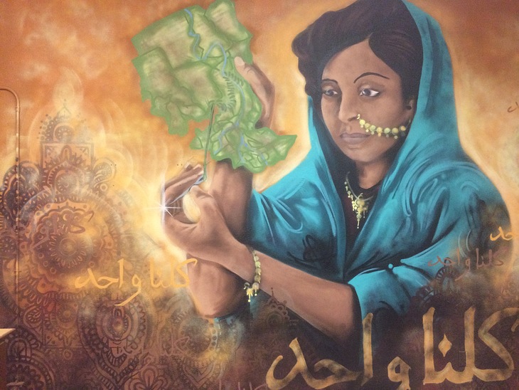 The mending of Sudan mural by Daniel Velasquez